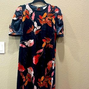 Black velvet dress with colorful flower accents